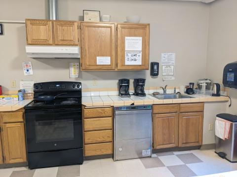 Oven, dishwasher, and coffee makers in Mayflower Room Kitchen